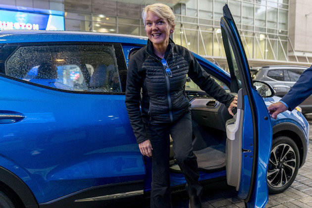Energy Secretary Jennifer Granholm tests drives an electric car.