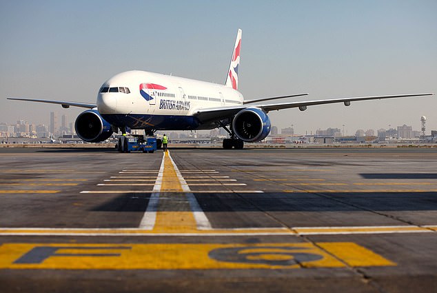 British Airways is investing £7billion over the next three years to 'revolutionise how teams train and work, rolling out the very latest technology to boost the customer experience'. Pictured is a BA Boeing 777 in Dubai
