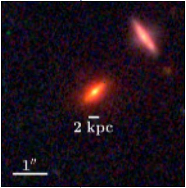 Eine Nahaufnahme von ZF-UDS-7329 zeigt seine gewaltige Größe.  Der Maßstabsbalken zeigt 2 Kiloparsec oder 6.530 Lichtjahre an.