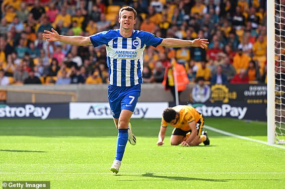 WOLVERHAMPTON, ENGLAND - AUGUST 19: Solly March of Brighton & Hove Albion celebrates after scoring the team's third goal during the Premier League match between Wolverhampton Wanderers and Brighton & Hove Albion at Molineux on August 19, 2023 in Wolverhampton, England. (Photo by Clive Mason/Getty Images)