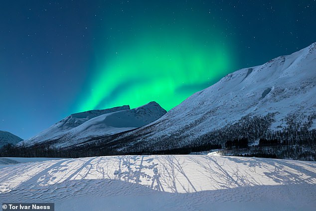 The aurora borealis occurs when energy waves from the sun react with the Earth's magnetic field and atmosphere. 'That's the science,' writes Laura. 'The result when you see it? Being rendered speechless is likely'