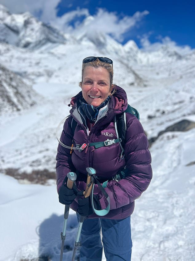 Corinne Turnbull climbing Everest. Posing  jubilantly for a photograph at Everest Base Camp that smile of triumph was especially hard-won – as just over a decade earlier, shortly before her 40th birthday, she was diagnosed with the bone-thinning disease osteoporosis