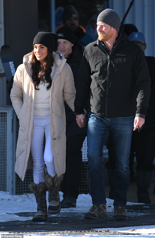 Meghan looked glamorous in skinny white jeans and a sweater topped with a beige quilted coat while Harry was dressed down in jeans and a black anorak