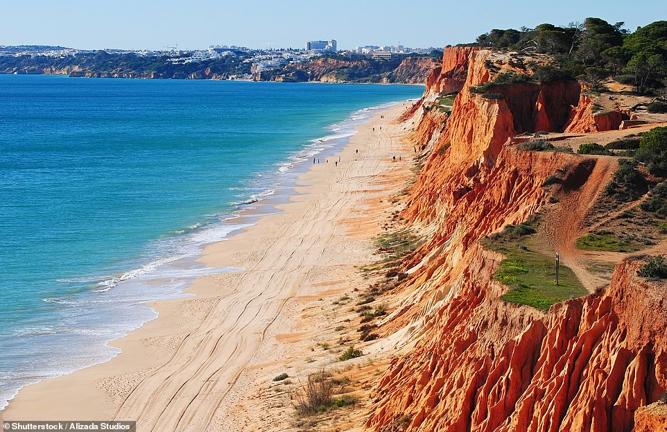 The number one beach to add to your bucket list is Praia da Falesia in Portugal's Algarve, according to Tripadvisor, which awarded it first place in its 2024 Travellers' Choice Best of the Best Awards for Beaches