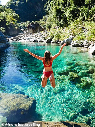 Lauren wild swimming in one of Taiwan's clear pools