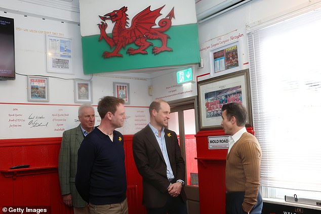 Prince William talks with Wrexham AFC co-owner Rob McElhenney at The Turf pub today
