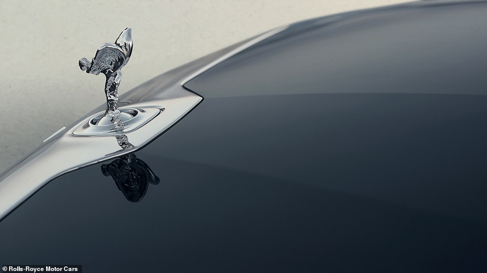 Like all modern Rollers. the Spirit of Ecstasy stashes away in a secret compartment behind the grille when the car isn't in use