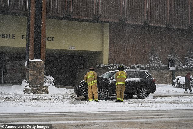 A vehicle collided with a snowplow as snow blanketed roads in South Lake Tahoe, California