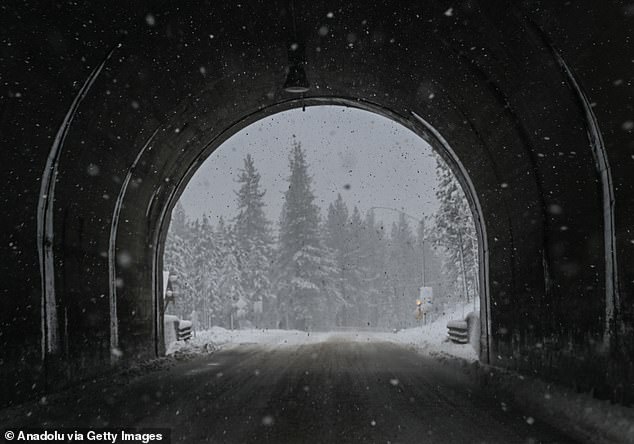 A view of snow blanketed road and tunnel in Truckee, California