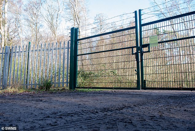 Fencing that has been put up by Sheikh Mohammed bin Rashid al-Maktoum around his Longcross estate in Surrey