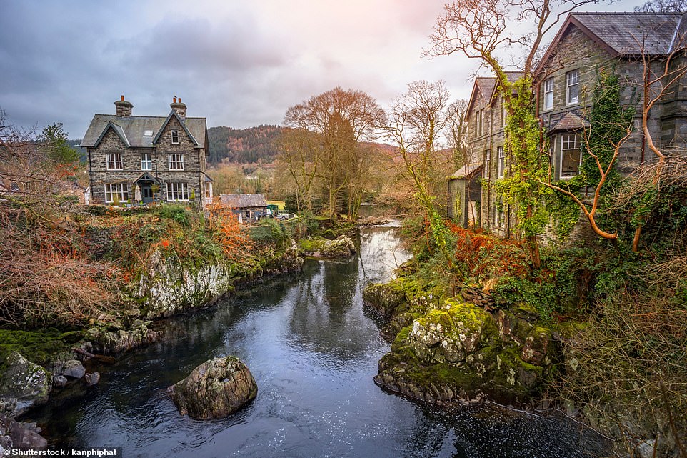 14. BETWS-Y-COED, SNOWDONIA, WALES: This Welsh village is 'as pretty as can be' with its slate houses set along a 'gentle river flanked by lush greenery'. It is described as the 'gateway to the grandeur of Snowdonia', with 'natural beauty aplenty'