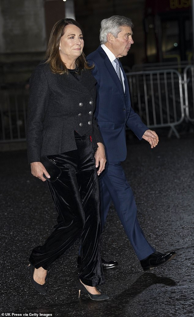 Kate's mother is also always on hand to support Kate for her annual 'Together At Christmas' Carol Service - a known passion project of the Princess's. Pictured with Michael st the event last year
