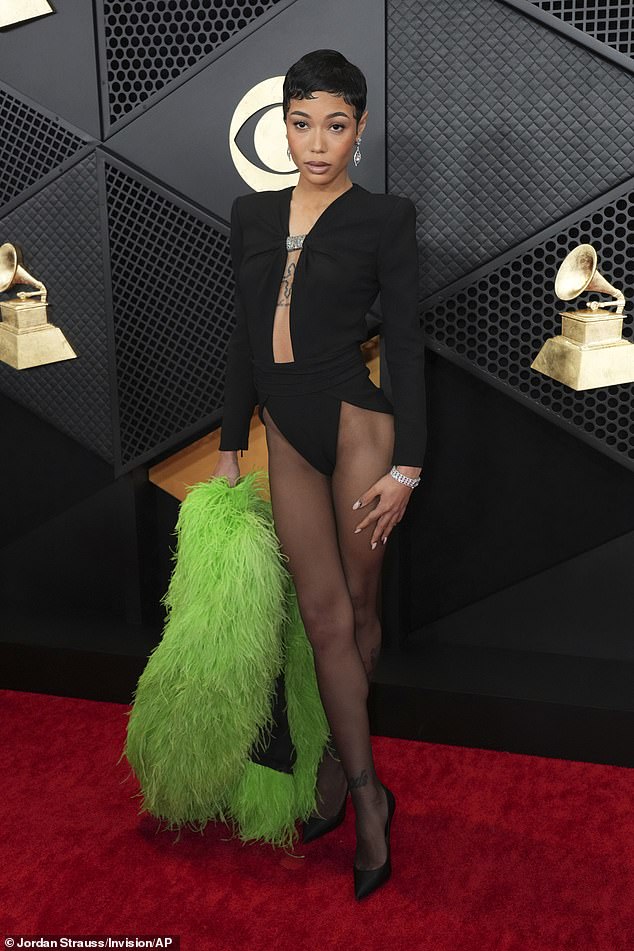 Meanwhile, US rapper Coi Lerpy wore another thigh-skimming outfit to the Grammy's. The Baby Don't Hurt Me hitmaker opted for a YSL bodysuit from the 2019 archive.