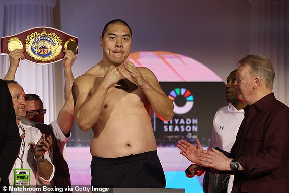 RIYADH, SAUDI ARABIA - MARCH 7: Zhilei Zhang and Joseph Parker go head to head at the weigh-in ahead of their fight on March 7, 2024 in Riyadh, Saudi Arabia. (Photo by Mark Robinson/Matchroom Boxing via Getty Images)