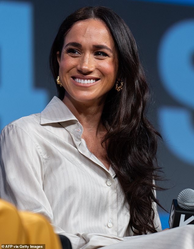 Meghan looked relaxed and happy throughout the chat, beaming widely as she spoke with her fellow panelists