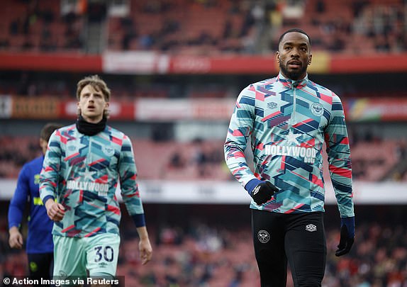 Soccer Football - Premier League - Arsenal v Brentford - Emirates Stadium, London, Britain - March 9, 2024  Brentford's Mads Roerslev and Ivan Toney during the warm up before the match Action Images via Reuters/John Sibley NO USE WITH UNAUTHORIZED AUDIO, VIDEO, DATA, FIXTURE LISTS, CLUB/LEAGUE LOGOS OR 'LIVE' SERVICES. ONLINE IN-MATCH USE LIMITED TO 45 IMAGES, NO VIDEO EMULATION. NO USE IN BETTING, GAMES OR SINGLE CLUB/LEAGUE/PLAYER PUBLICATIONS.