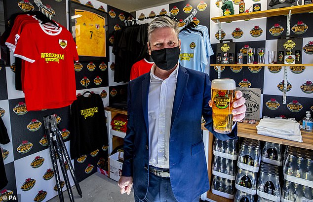 The leader of the Labour party has been photographed enjoying a pint of beer on many occasions. Seen in 2021 during a visit to Wrexham Larger Brewery