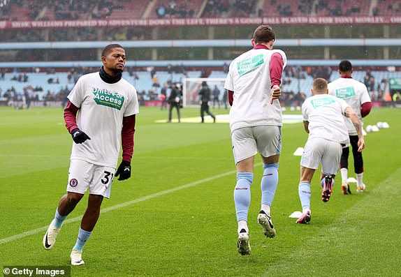 BIRMINGHAM, ENGLAND - MARCH 10: Leon Bailey of Aston Villa warms up whilst wearing a 'Unite For Access' warm up top prior to the Premier League match between Aston Villa and Tottenham Hotspur at Villa Park on March 10, 2024 in Birmingham, England. (Photo by Catherine Ivill/Getty Images)