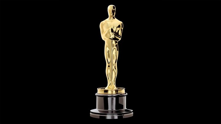 Die Oscar-Statue auf schwarzem Hintergrund.