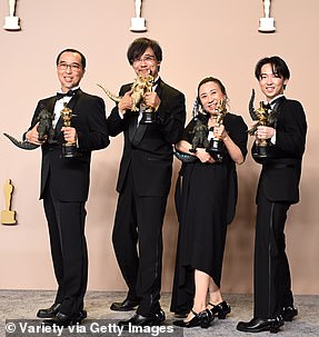 Godzilla Minus One won the Visual Effects award as Masaki Takahashi, Takashi Yamazaki, Kiyoko Shibuya and Tatsuji Nojima are pictured