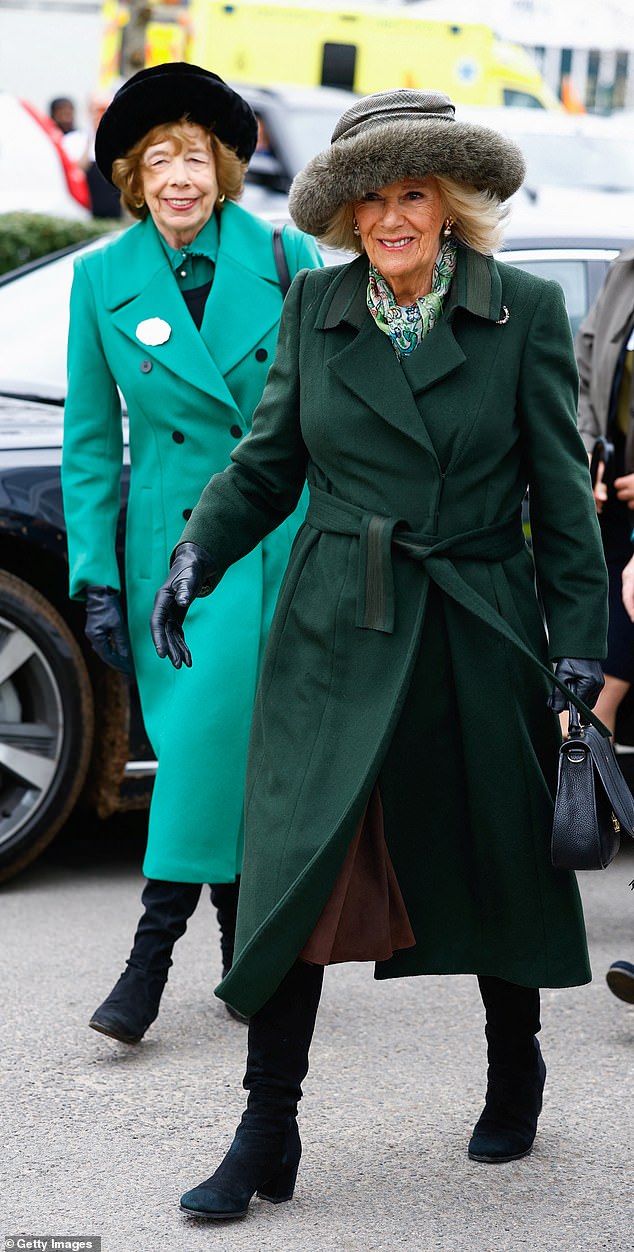 Gorgeous in green! Queen Camilla attends Cheltenham Festival