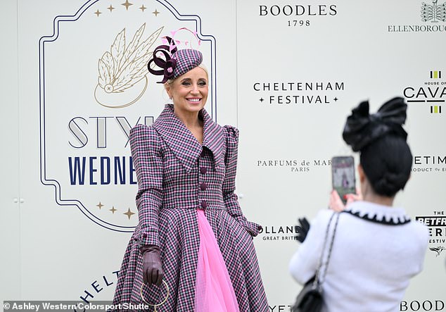 One reveller looked the bell of the ball in a pink and purple fairytale inspired number