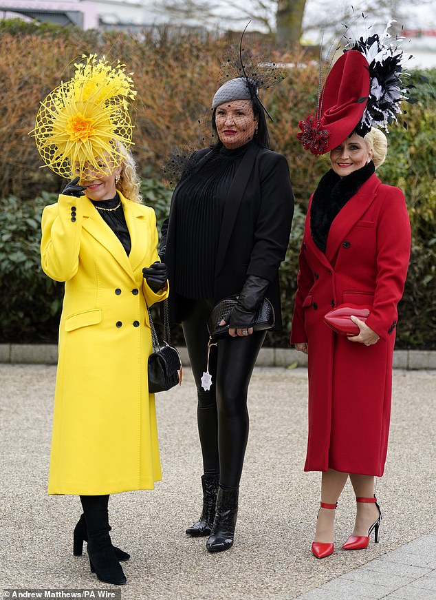 One racegoer commanded attention in a sunshine yellow blazer and feather headpiece