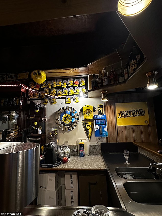 Dortmund memorabilia behind the bar at the Lütge-Eck pub in the city, where support of the local football team is fanatical