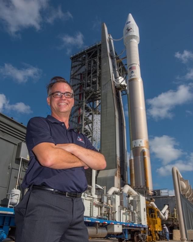 Dante with the Atlas V rocket that launched OSIRIS-REx into space