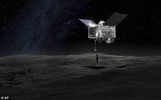 An artist's rendering depicts the OSIRIS-REx spacecraft contacting the asteroid Bennu with the Touch-And-Go Sample Acquisition Mechanism