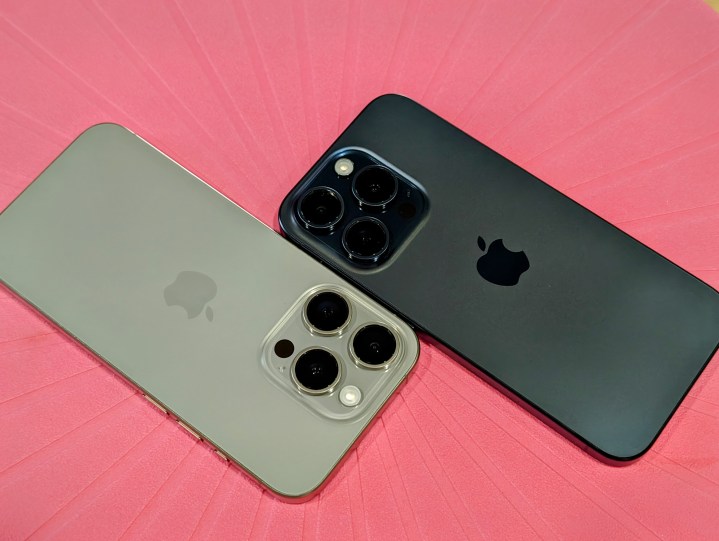 A natural and blue titanium iPhone 15 Pro side-by-side.