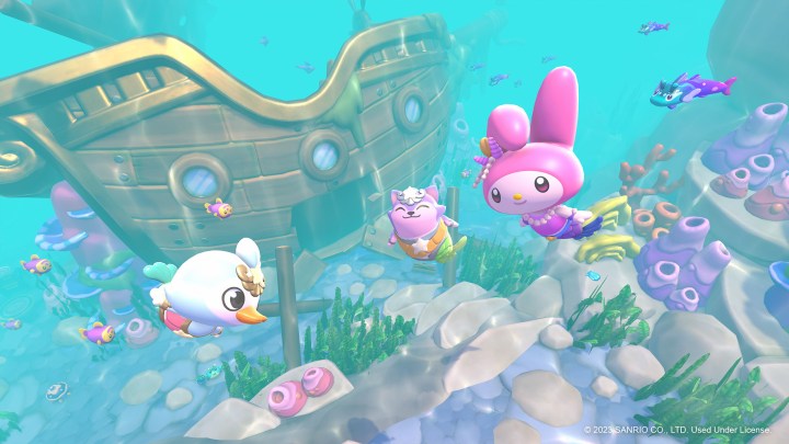 Hello Kitty characters swim underwater in Hello Kitty: Island Adventure.