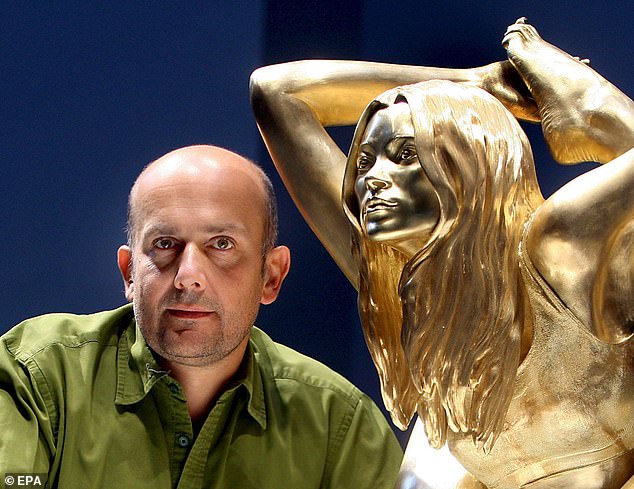 British artist Marc Quinn stands with his solid gold sculpture of British supermodel Kate Moss at the British Museum
