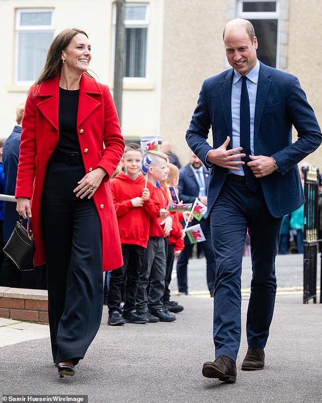 Millions of people breathed a collective sigh of relief when they saw 'happy, relaxed and healthy' Kate (pictured with William in Swansea in September 2022) smiling as she briskly walked away from the store holding onto a full shopping bag on Saturday