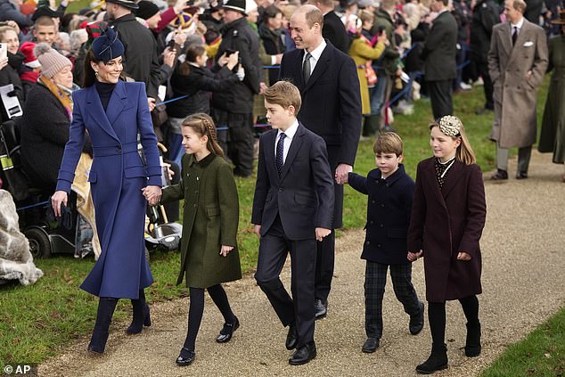 The Princess of Wales holding the hand of her daughter Charlotte as she walks to Christmas Day service in Sandringham, Norfolk, alongside her sons George and Louis, her husband Prince William and Mia Tindall on December 25, last year
