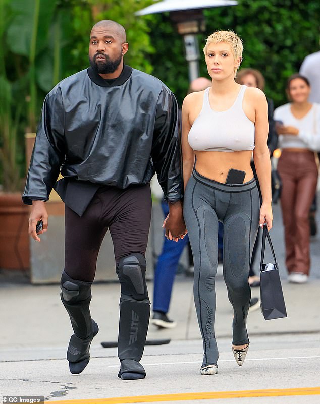 In October a source claimed that the model adheres to strict 'rules' from Ye, which includes mandated fitness. Pictured in May