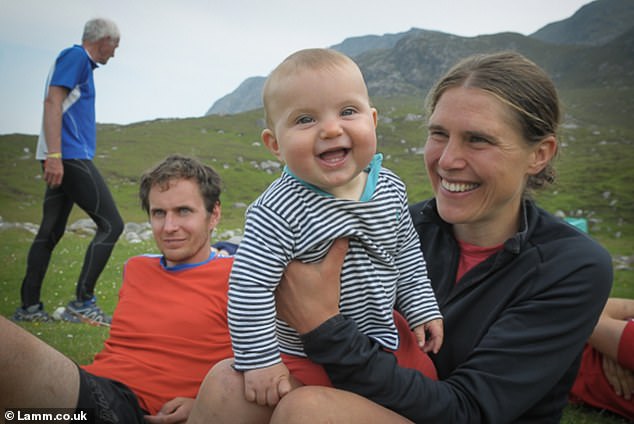 Jasmin and her husband Konrad with their daughter Rowan in 2018 - after competing in a fell run together