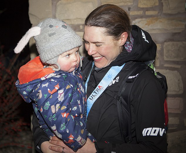 Pictured: Jasmin with her daughter Rowan after finishing the Montane Spine in 2019. During the race, she also experienced hallucinations
