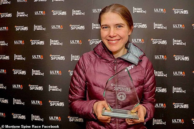Pictured: Jasmin seen holding her Montane Spine award in 2019. The mother-of-two beat her male counterparts to first place