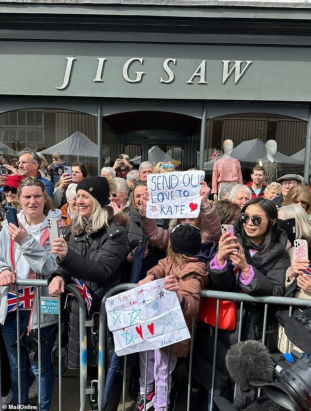 Well-wishers hold messages of support for the Princess of Wales in Shrewsbury today