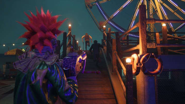 A clown aims a gun at survivors in Killer Klowns from Outer Space: The Game.