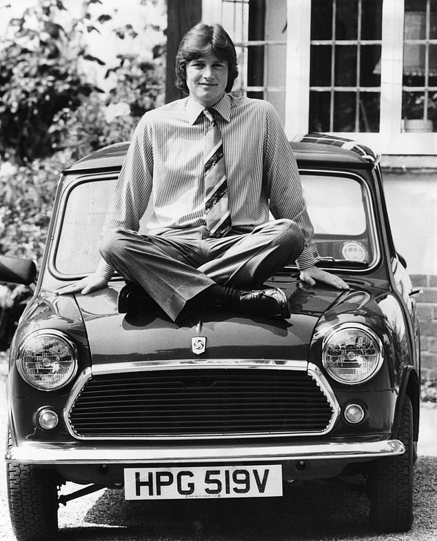 Footballer Kevin Ball photographed with his first Mini at his Farnham home in the 1980s