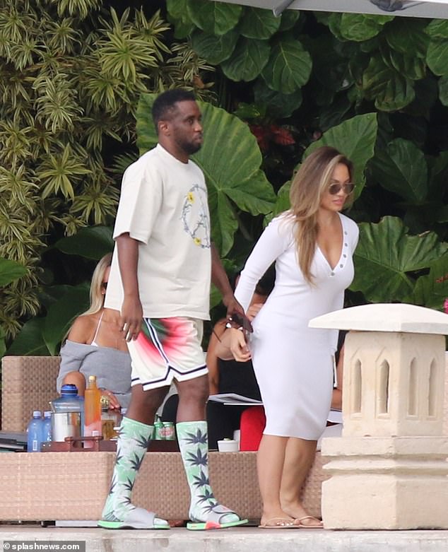 Joy is pictured with Diddy in Miami Beach in 2021 - she has called claims she was the star's sex worker 'character assassination'