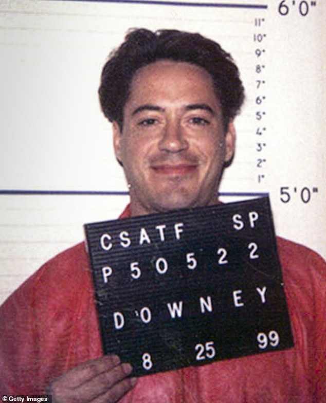 Reformed cocaine addict Downey is pictured here in his mug shot taken at the California Department of Corrections to start his three year spell behind bars