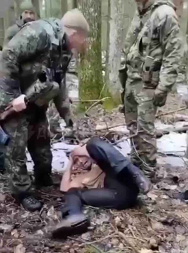The 90-second-long footage, shared via Telegram, shows Russian border guards and FSB agents furiously chasing a man understood to be suspect Saidakrami Murodalii Rachabalizoda through dense woodlands