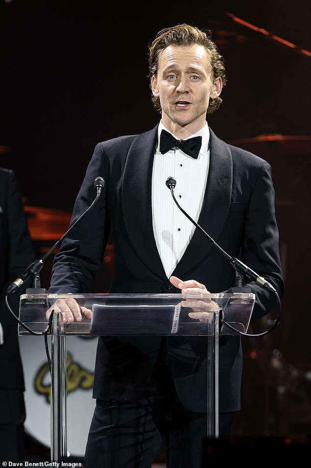Tom looked dapper in a bow tie and a crisp white ruffle shirt