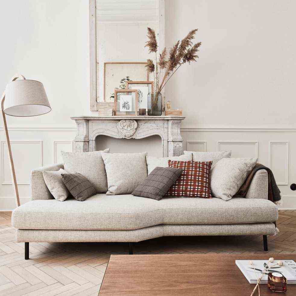   A beige white and taupe living room 
