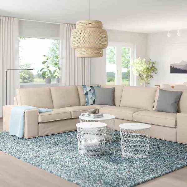 Modern beige and white living room touch of blue -