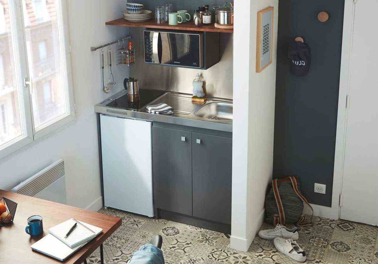 A Kitchenette Behind A Partition -