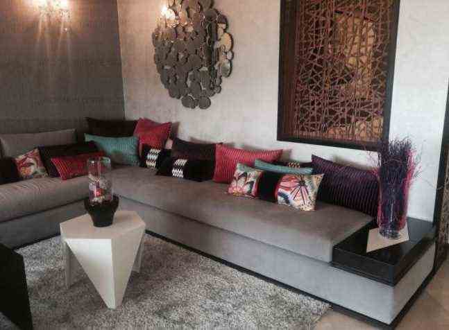 Moroccan Living Room With Gray Sofa And Cushions